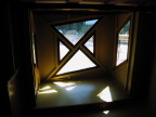 geometric windows in a treehouse